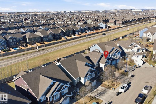 Aerial perspective showcasing a residential community with varied architectural styles - 7323 24 Ave, Edmonton, AB - Outdoor With View