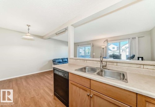 16320 56 Street, Edmonton, AB - Indoor Photo Showing Kitchen With Double Sink