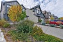 Modern two-story residence featuring a dark gray and beige exterior with peaked rooflines - 1737 Dumont Crescent, Edmonton, AB  - Outdoor 