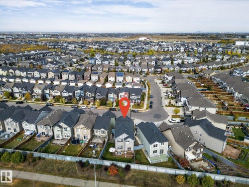 Aerial overview of a residential neighborhood featuring detached and semi-detached homes - 1737 Dumont Crescent, Edmonton, AB - Outdoor With View