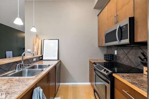 415 10531 117 Street, Edmonton, AB - Indoor Photo Showing Kitchen With Stainless Steel Kitchen With Double Sink