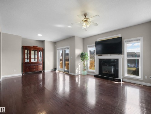 2511 29 Street, Edmonton, AB - Indoor Photo Showing Living Room With Fireplace