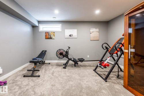 10923 130 Street, Edmonton, AB - Indoor Photo Showing Gym Room