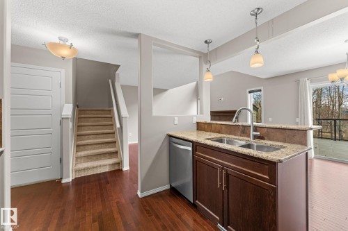 516 Fairway Terrace, Stony Plain, AB - Indoor Photo Showing Kitchen With Double Sink