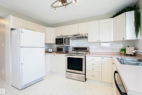 1403 Jefferys Crescent, Edmonton, AB - Indoor Photo Showing Kitchen With Double Sink