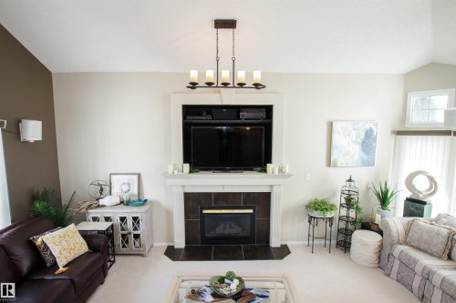 1403 Jefferys Crescent, Edmonton, AB - Indoor Photo Showing Living Room With Fireplace
