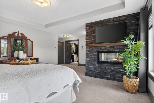 3706 Westcliff Way, Edmonton, AB - Indoor Photo Showing Bedroom With Fireplace