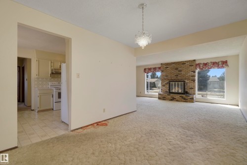 10912 40 Avenue, Edmonton, AB - Indoor Photo Showing Living Room With Fireplace