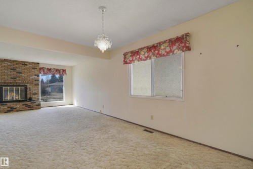 10912 40 Avenue, Edmonton, AB - Indoor Photo Showing Other Room With Fireplace