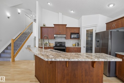 10807 6 Avenue Sw, Edmonton, AB - Indoor Photo Showing Kitchen With Stainless Steel Kitchen With Double Sink With Upgraded Kitchen