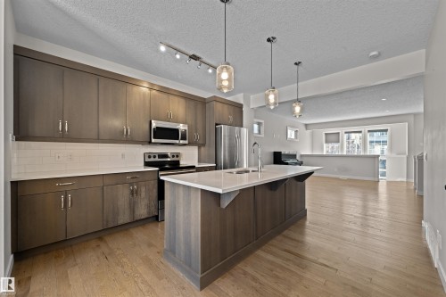 6906 Cardinal Wynd, Edmonton, AB - Indoor Photo Showing Kitchen With Stainless Steel Kitchen With Upgraded Kitchen