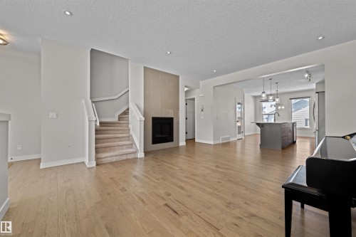 6906 Cardinal Wynd, Edmonton, AB - Indoor Photo Showing Living Room With Fireplace