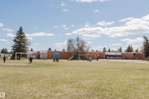 Expansive grassy field with a soccer goal - 3752 114 Street, Edmonton, AB - Outdoor