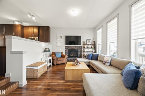 16460 15 Avenue, Edmonton, AB - Indoor Photo Showing Living Room With Fireplace