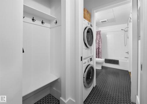 210 10024 Jasper Avenue, Edmonton, AB - Indoor Photo Showing Laundry Room