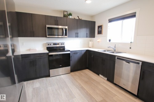 2509 14 Avenue, Edmonton, AB - Indoor Photo Showing Kitchen With Double Sink