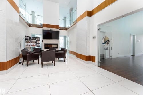 1404 11969 Jasper Avenue, Edmonton, AB - Indoor Photo Showing Other Room With Fireplace