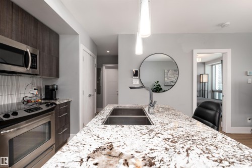 1404 11969 Jasper Avenue, Edmonton, AB - Indoor Photo Showing Kitchen With Double Sink