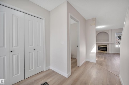 4124 37A Avenue, Edmonton, AB - Indoor Photo Showing Other Room With Fireplace