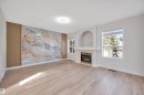 4124 37A Avenue, Edmonton, AB  - Indoor Photo Showing Living Room With Fireplace 