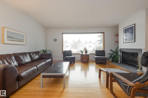 15702 89A Avenue, Edmonton, AB - Indoor Photo Showing Living Room With Fireplace