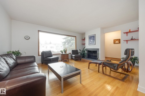 15702 89A Avenue, Edmonton, AB - Indoor Photo Showing Living Room With Fireplace
