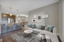 243 6079 Maynard Way, Edmonton, AB  - Indoor Photo Showing Living Room 