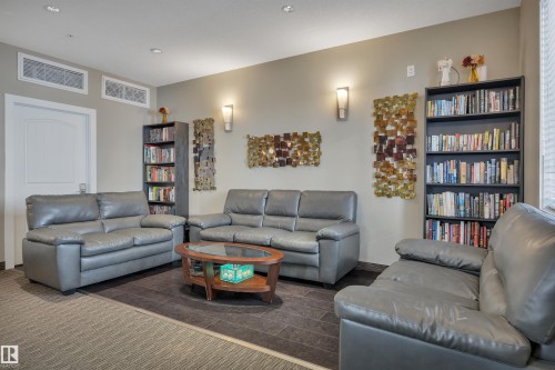 243 6079 Maynard Way, Edmonton, AB - Indoor Photo Showing Living Room