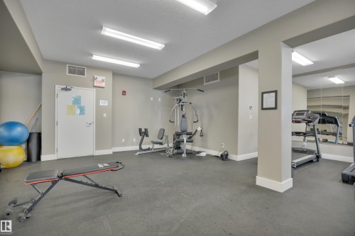243 6079 Maynard Way, Edmonton, AB - Indoor Photo Showing Gym Room