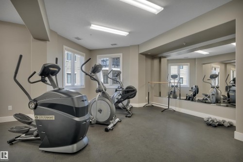 243 6079 Maynard Way, Edmonton, AB - Indoor Photo Showing Gym Room