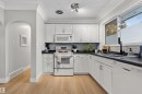 16 Mural Crescent, St. Albert, AB  - Indoor Photo Showing Kitchen With Double Sink 