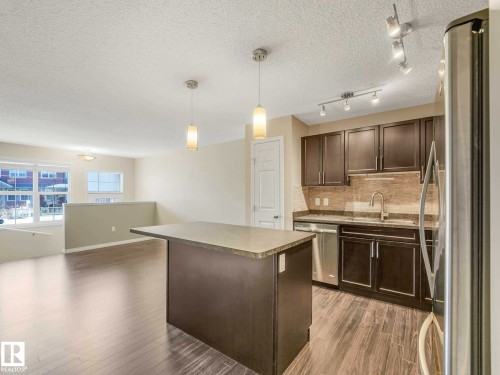24 4029 Orchards Drive, Edmonton, AB - Indoor Photo Showing Kitchen With Double Sink With Upgraded Kitchen
