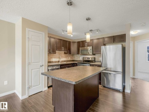 24 4029 Orchards Drive, Edmonton, AB - Indoor Photo Showing Kitchen With Stainless Steel Kitchen With Double Sink With Upgraded Kitchen