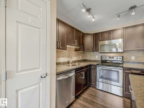 24 4029 Orchards Drive, Edmonton, AB - Indoor Photo Showing Kitchen With Stainless Steel Kitchen With Double Sink