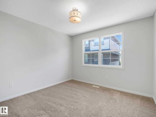 24 4029 Orchards Drive, Edmonton, AB - Indoor Photo Showing Other Room