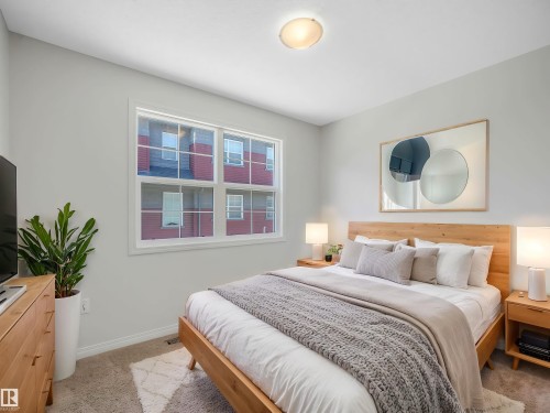 Virtually Staged - 24 4029 Orchards Drive, Edmonton, AB - Indoor Photo Showing Bedroom