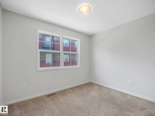 24 4029 Orchards Drive, Edmonton, AB - Indoor Photo Showing Other Room