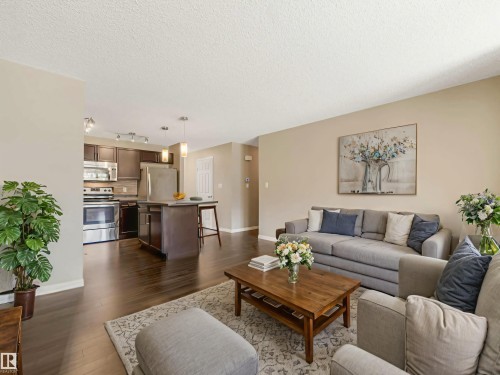 Virtually Staged - 24 4029 Orchards Drive, Edmonton, AB - Indoor Photo Showing Living Room