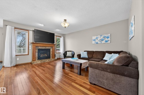 474 Riverpark Drive, Fort Saskatchewan, AB - Indoor Photo Showing Living Room With Fireplace
