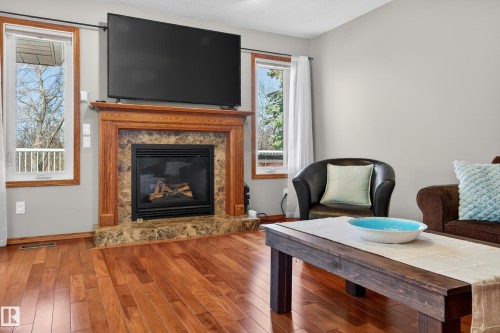474 Riverpark Drive, Fort Saskatchewan, AB - Indoor Photo Showing Living Room With Fireplace