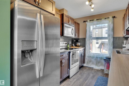 309 401 Southfork Drive, Leduc, AB - Indoor Photo Showing Kitchen