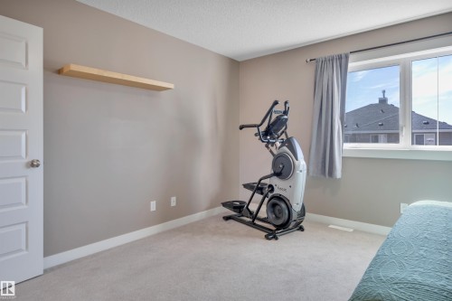 309 401 Southfork Drive, Leduc, AB - Indoor Photo Showing Gym Room
