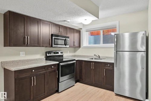 9483 227 Street, Edmonton, AB - Indoor Photo Showing Kitchen With Upgraded Kitchen