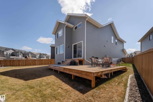Expansive wooden deck providing generous outdoor living space - 1450 Darby Green, Edmonton, AB - Outdoor With Deck Patio Veranda With Exterior