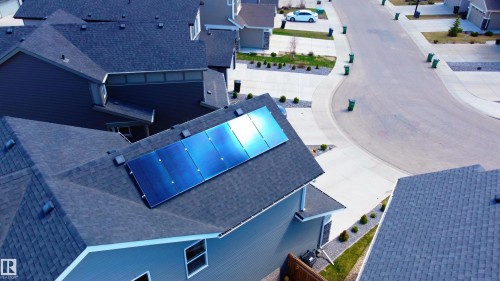 Asphalt shingle roof with solar panel array - 1450 Darby Green, Edmonton, AB - Outdoor