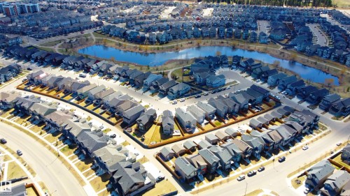 Aerial perspective of a developed residential area featuring a curvilinear street layout - 1450 Darby Green, Edmonton, AB -  With View