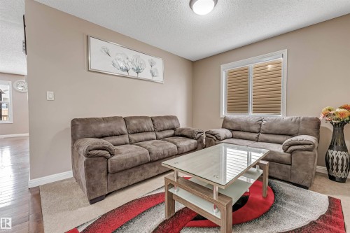 3236 26 Avenue, Edmonton, AB - Indoor Photo Showing Living Room
