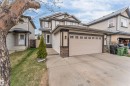 Contemporary two-story residence with a light-toned exterior siding and dark trim accents - 3236 26 Avenue, Edmonton, AB  - Outdoor With Facade 