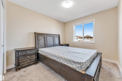 Bedroom featuring a single window, neutral wall paint, and recessed lighting - 1715 27 Street, Edmonton, AB - Indoor Photo Showing Bedroom