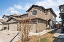 Contemporary two-story residence with a beige siding exterior and dark trim accents - 1715 27 Street, Edmonton, AB  - Outdoor 